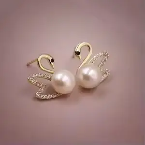 swan shaped earings